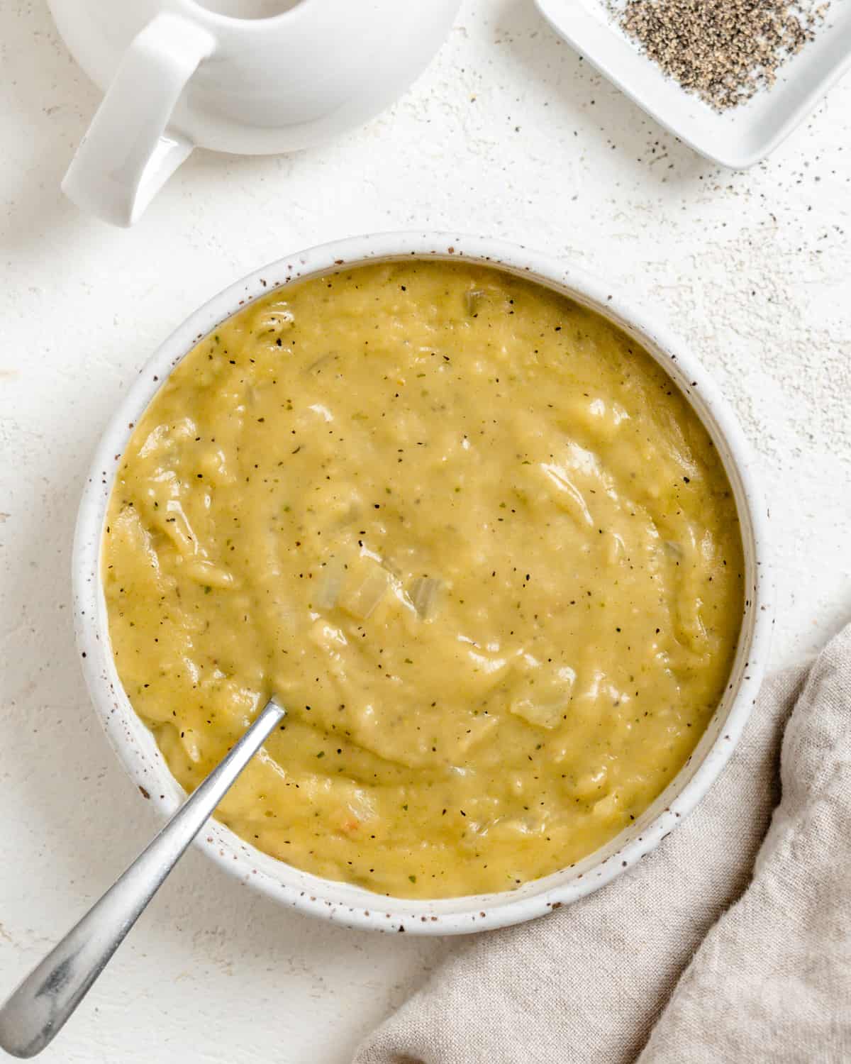 completed Easy Vegan Gravy in a bowl against a light surface
