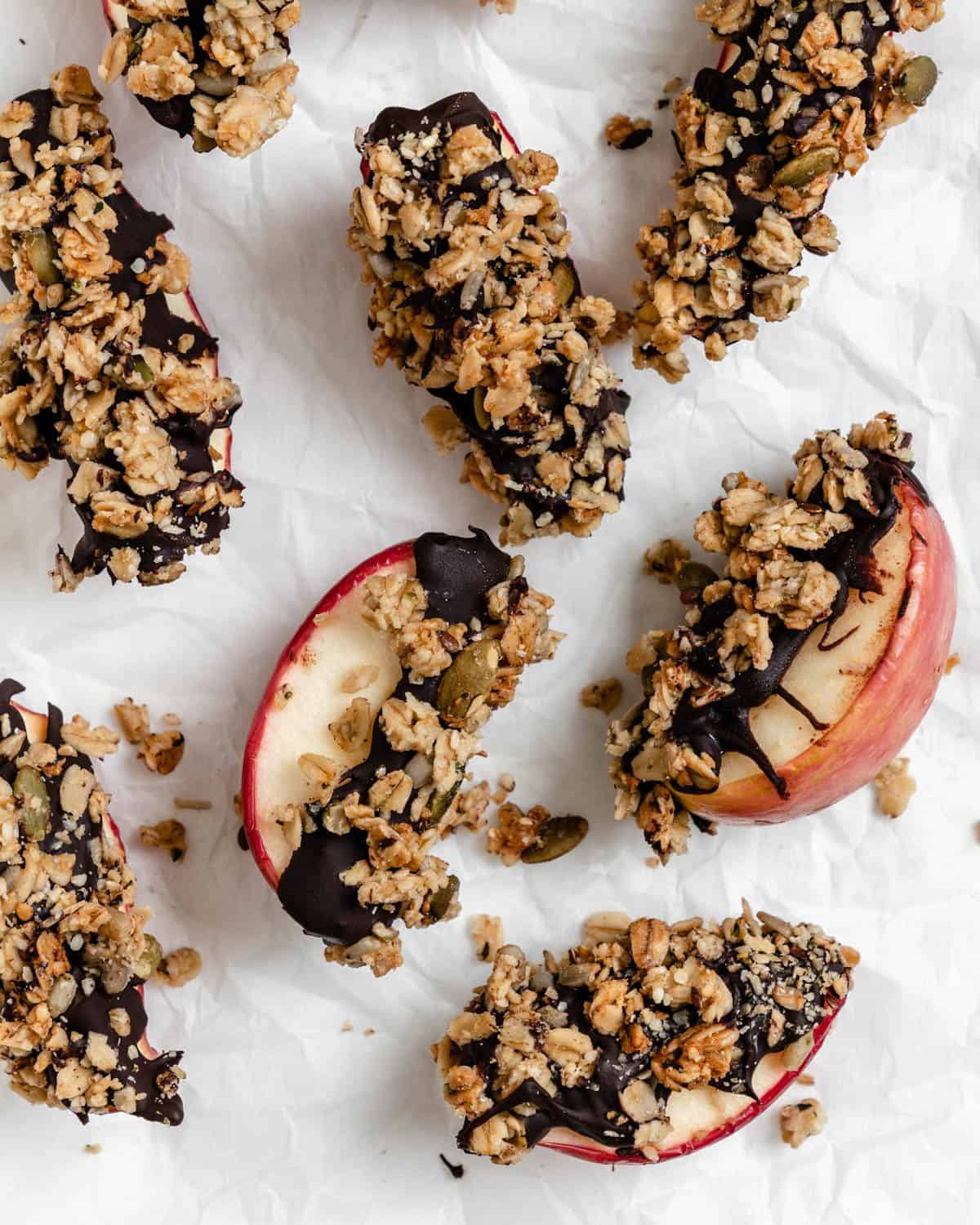 several completed Healthy Apple Snacks with Granola against a white surface