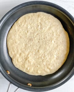 process of pancake batter in pan
