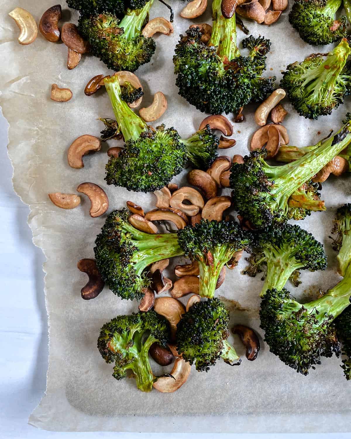 finished Roasted Curried Broccoli on parchment paper