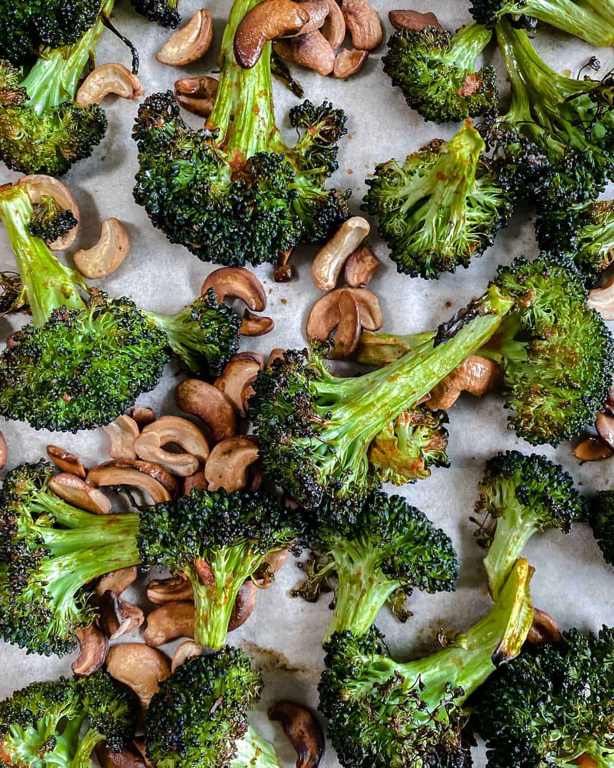 finished Roasted Curried Broccoli on parchment paper