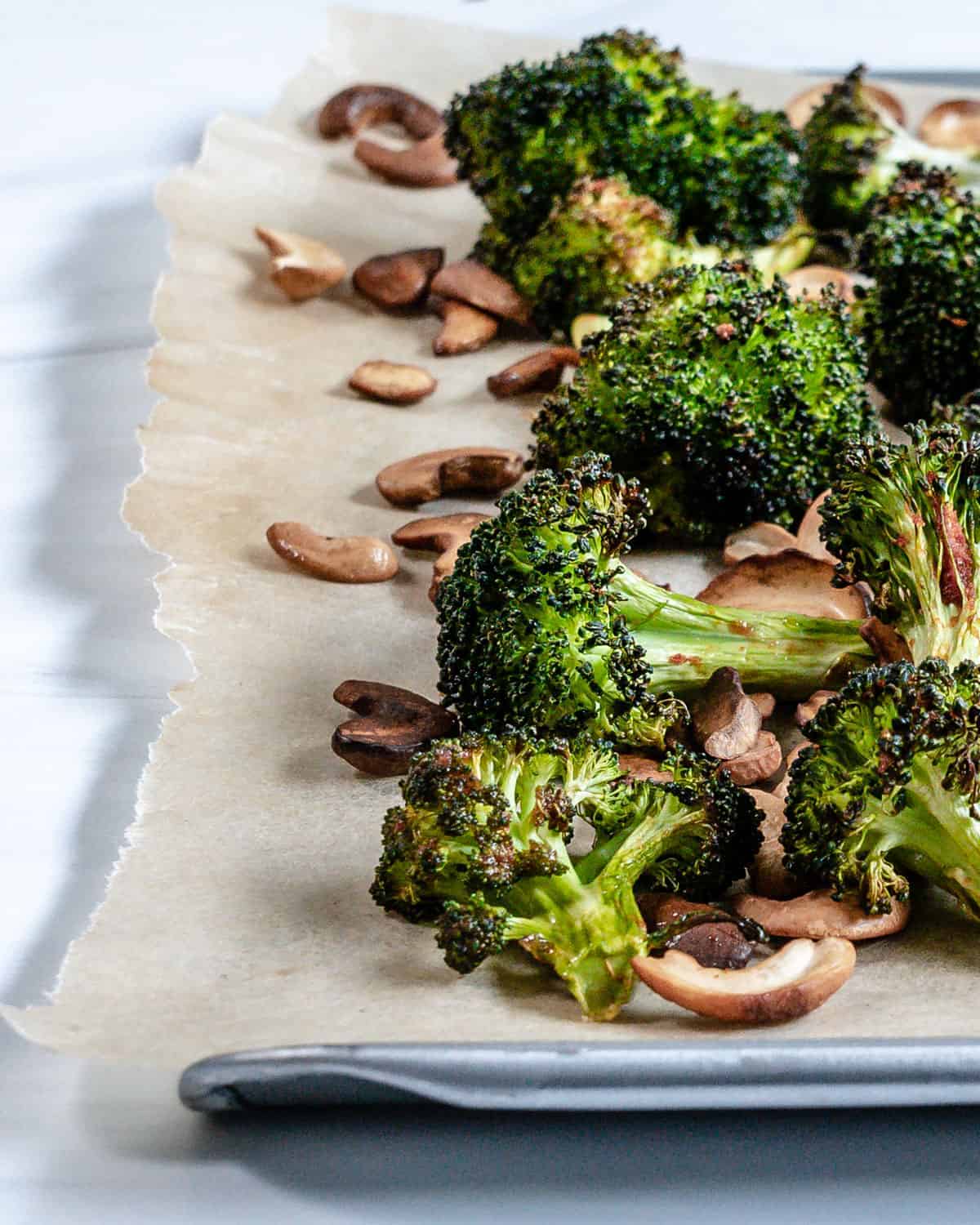 finished Roasted Curried Broccoli on parchment paper