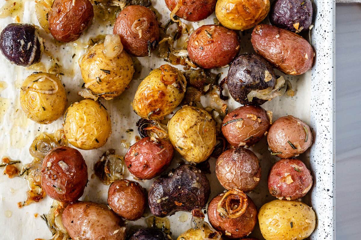 completed Roasted Rosemary Potatoes in a white tray