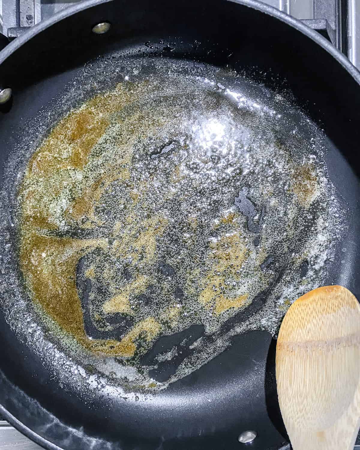 process of vegan butter melted in pan