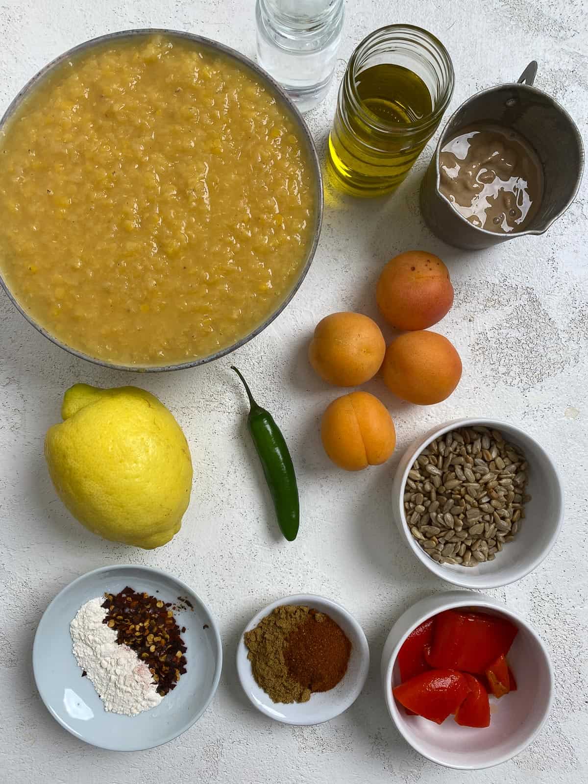 ingredients for Easy Yellow Lentil Hummus measured out against a white background