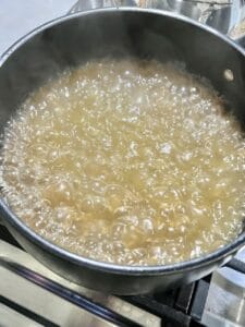 process of cooking farro in a pot 