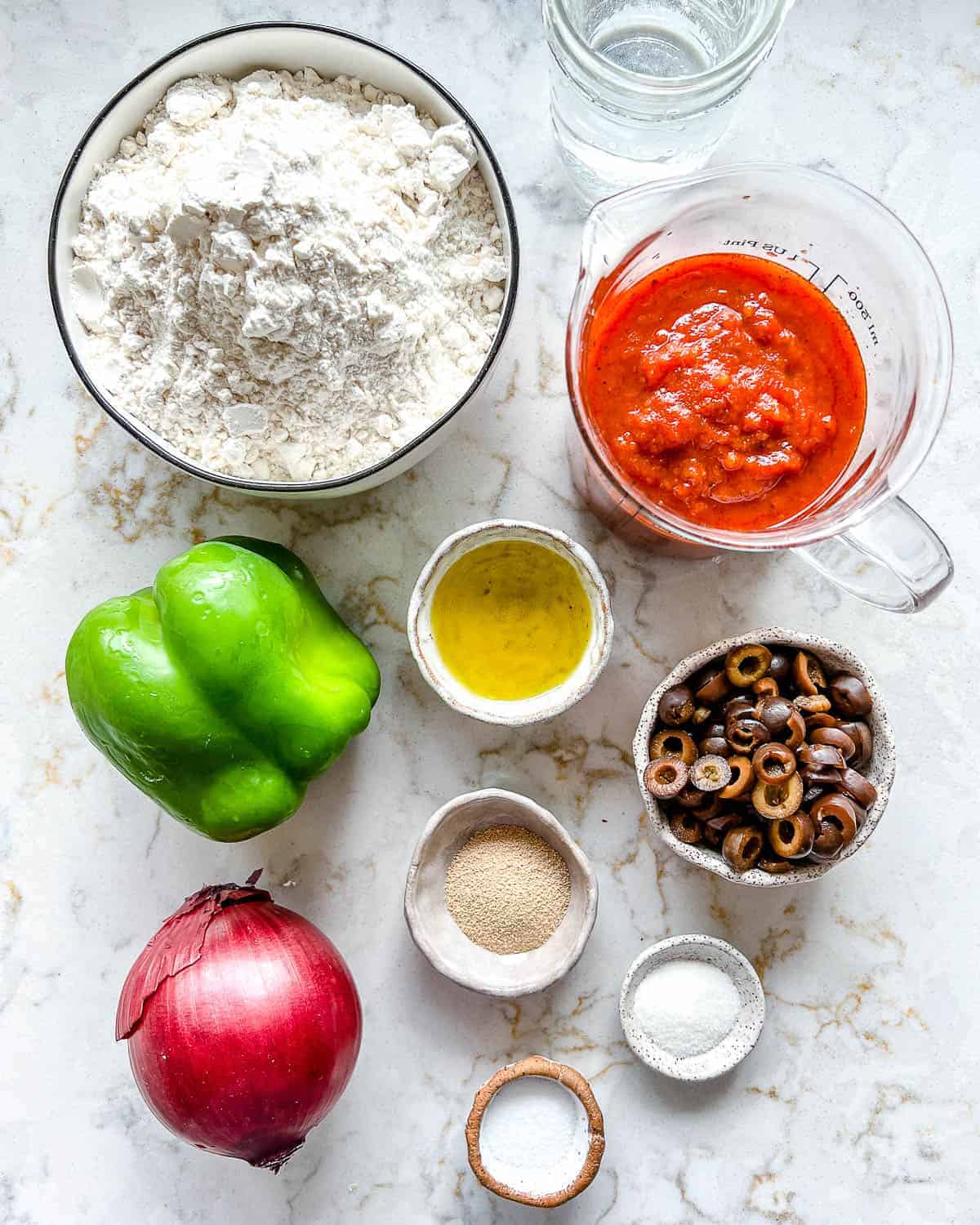 measured out ingredients for Marinara Calzone against white surface