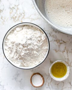 measured out flour in bowl against white surface