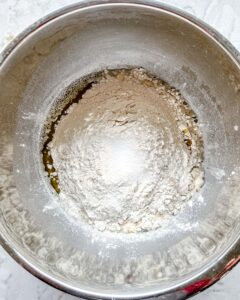 process of forming dough in bowl
