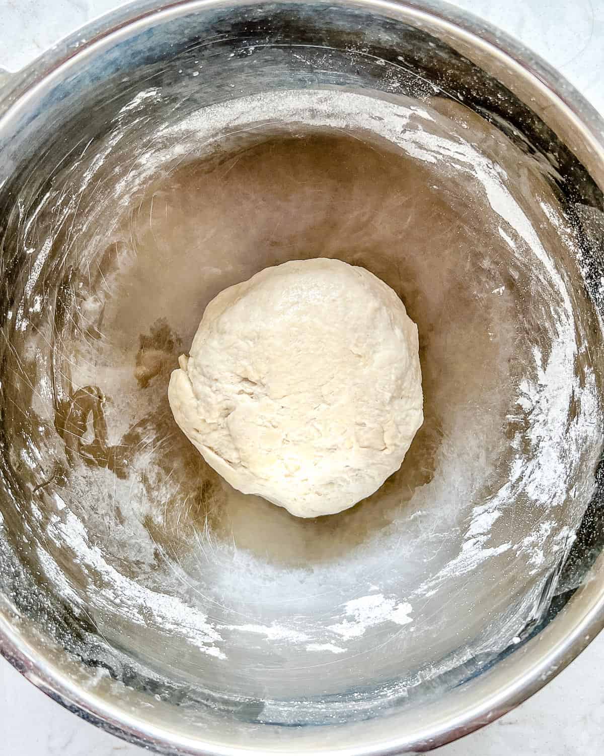 process of rolled dough in bowl