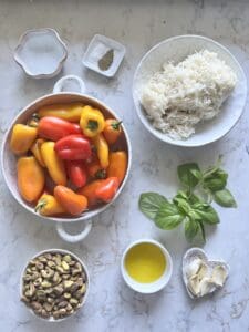 ingredients for Stuffed Roasted Sweet Peppers against a white background