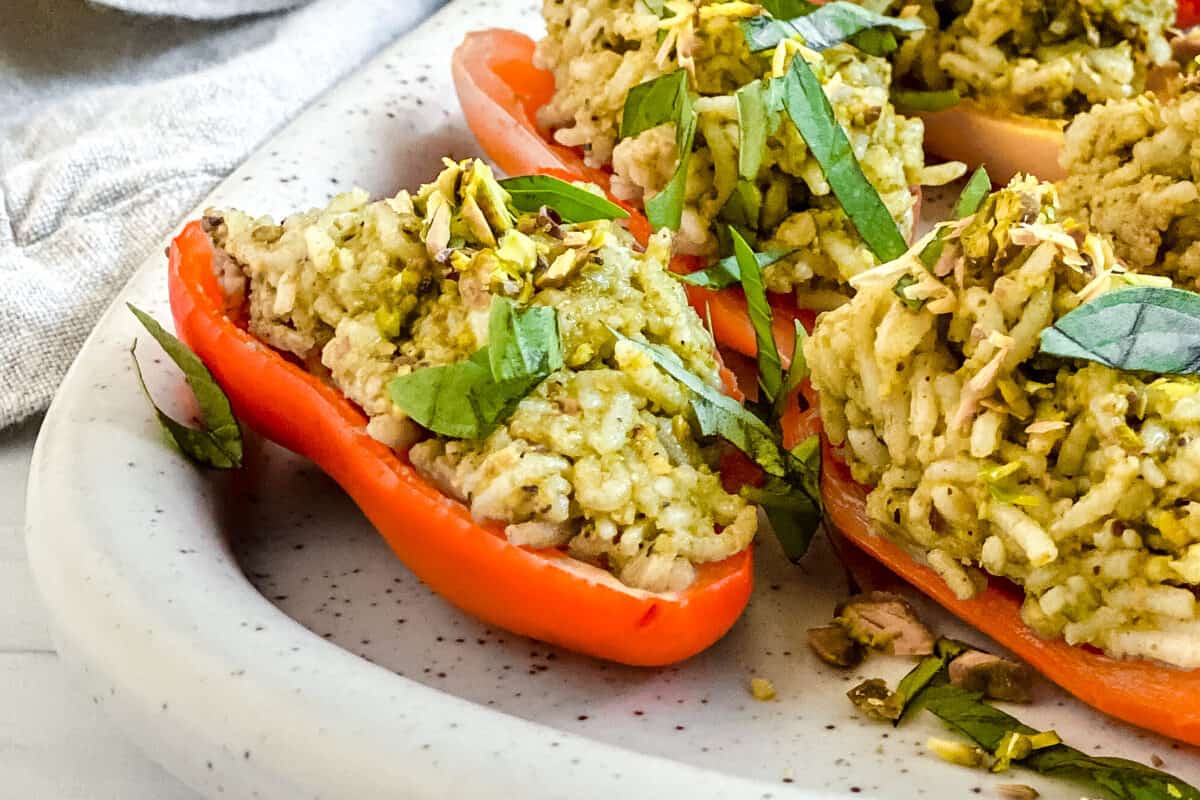 finished Stuffed Roasted Sweet Peppers plated on a white tray