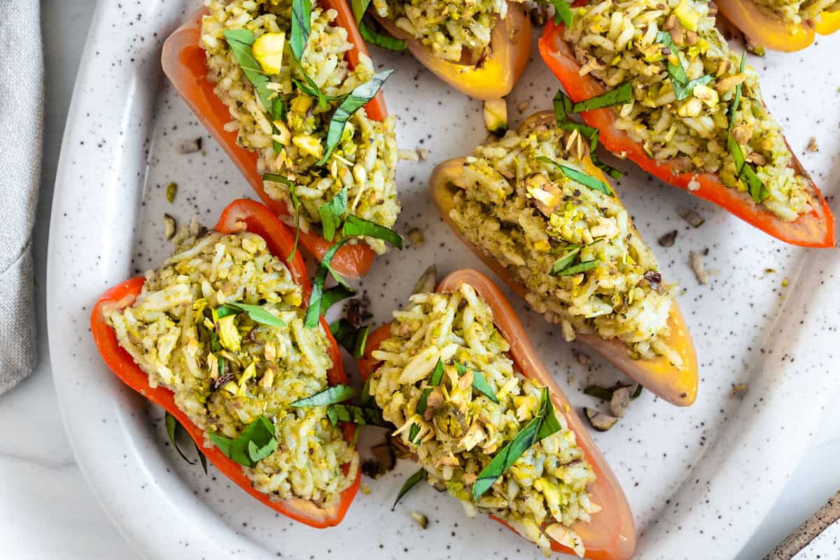 finished Stuffed Roasted Sweet Peppers plated on a white tray