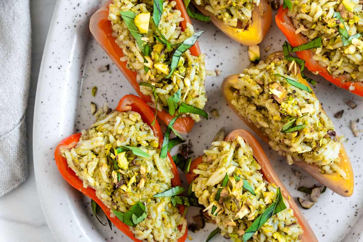 finished Stuffed Roasted Sweet Peppers plated on a white tray