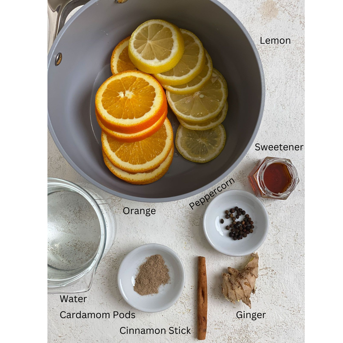 ingredients for Winter Tonic measured out against a white surface