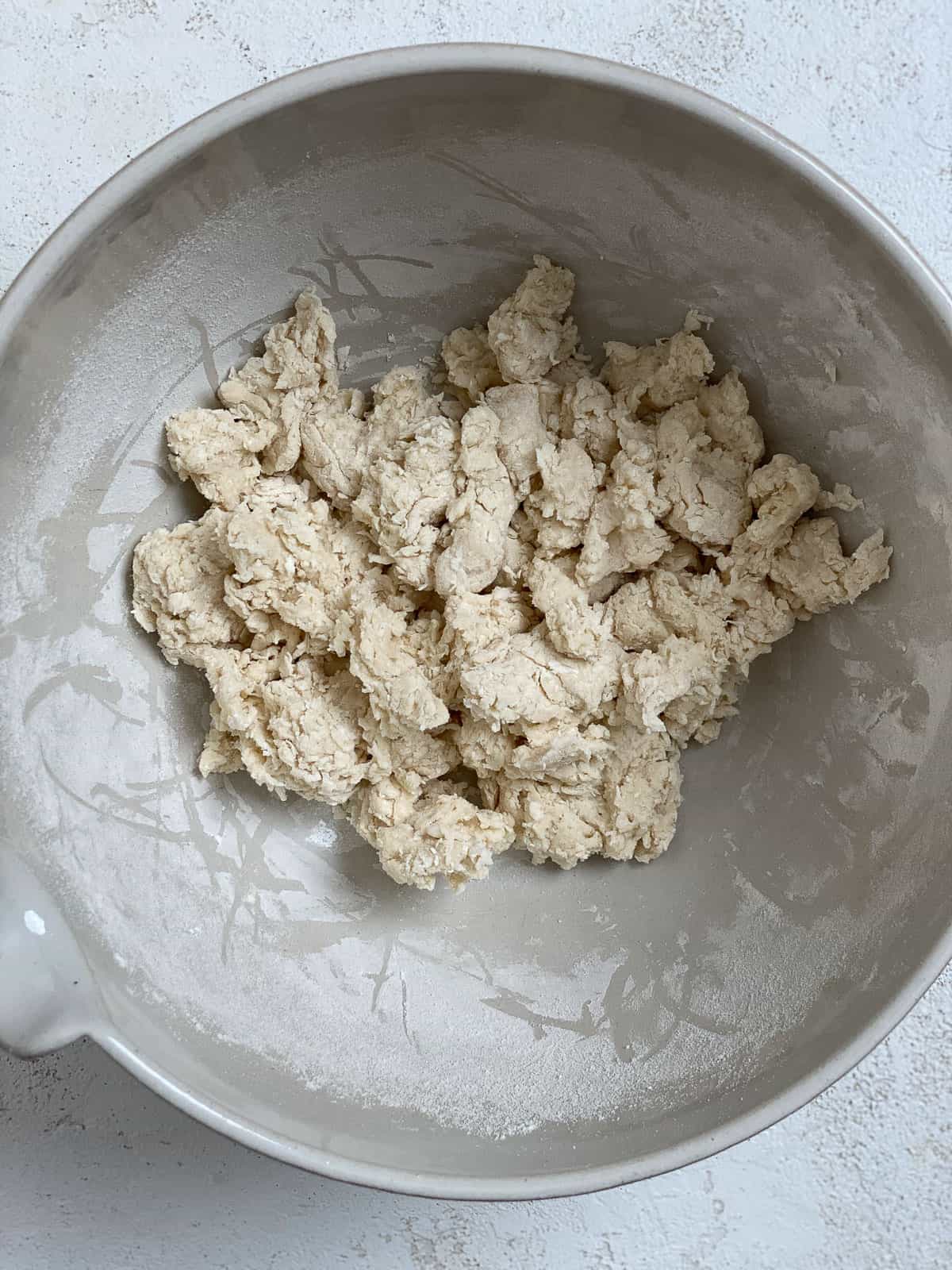 process shot of mixing flour in bowl