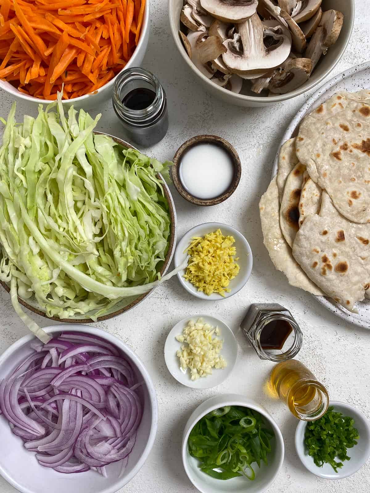 Moo Shu Vegetable ingredients measured out against a white surface