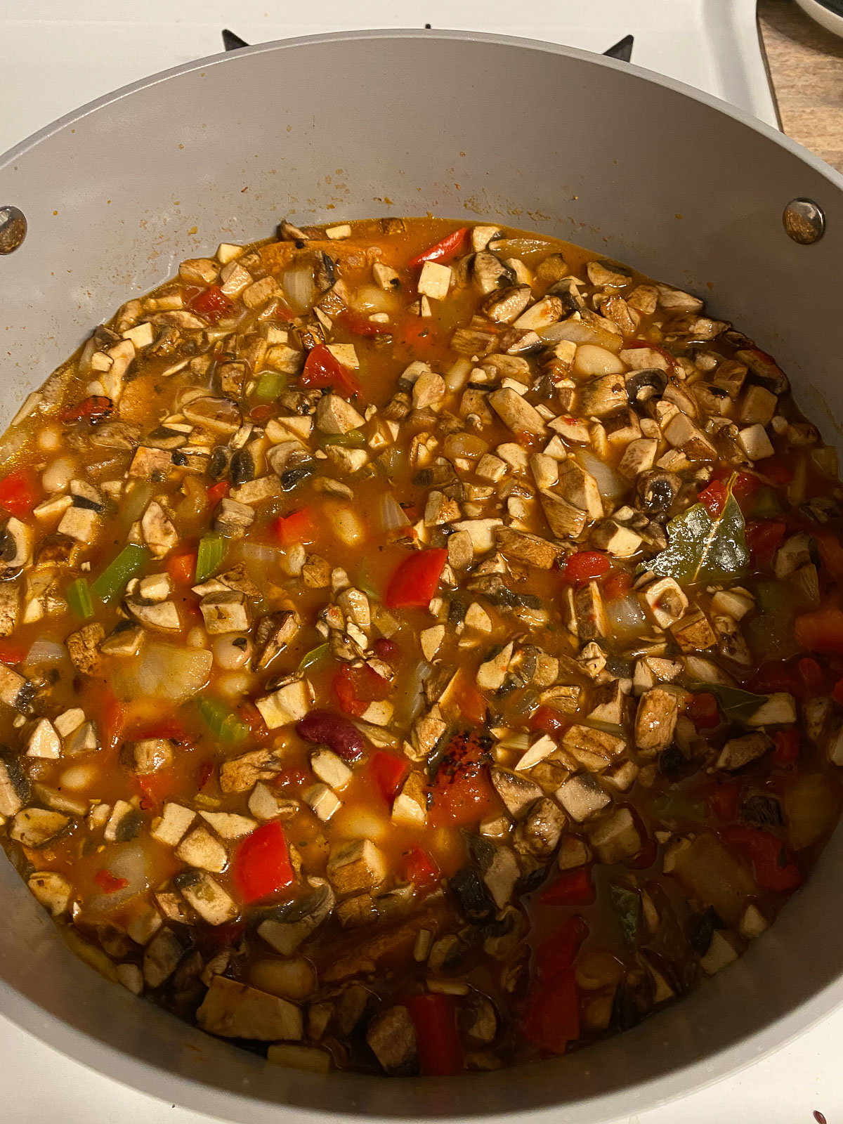 process shot of vegan gumbo simmering in pan
