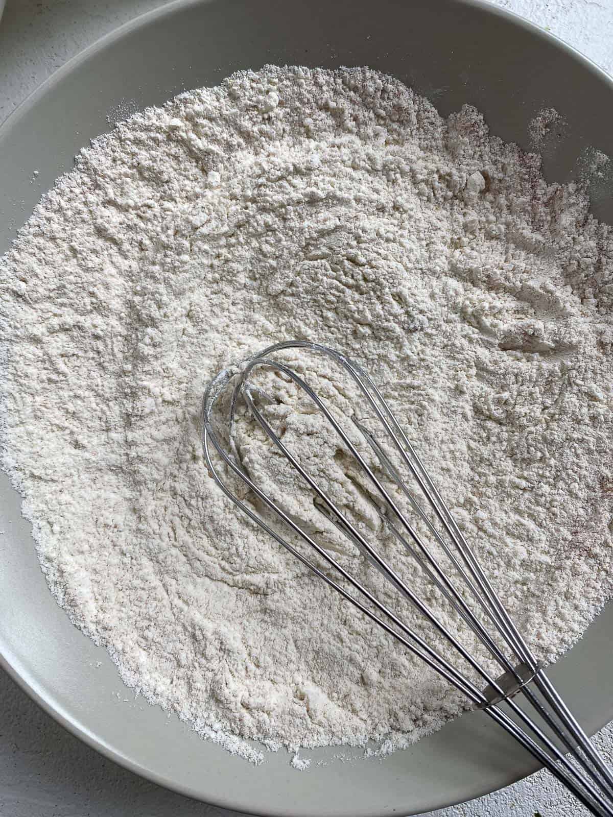 process shot of mixing flour in pot