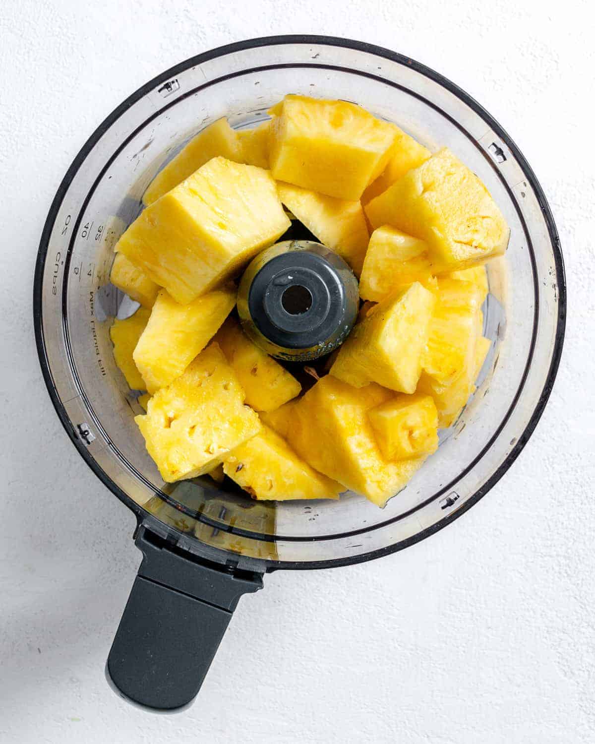 process shot of pineapples in blender