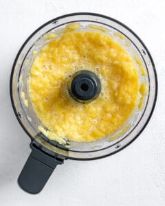 process shot post blending pineapple in blender