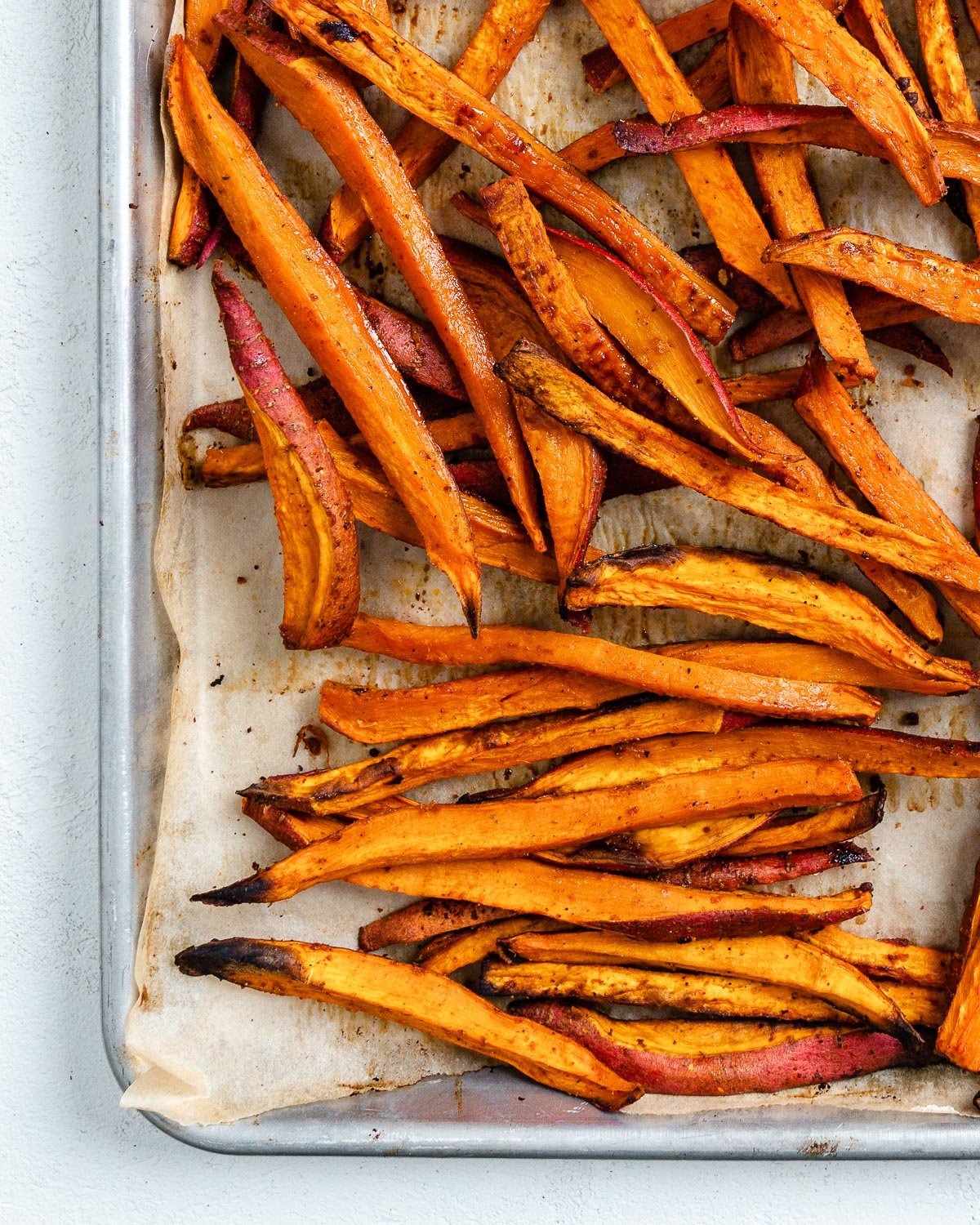 completed sweet potato fries in a baking tray