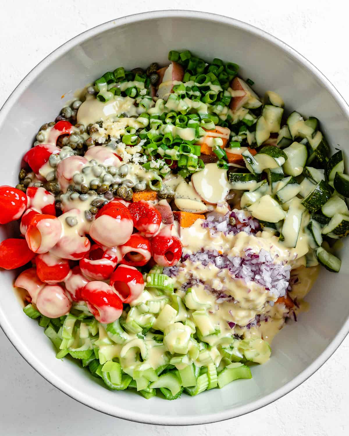 post adding dressing into bowl of Sweet Potato Salad ingredients prior to mixing