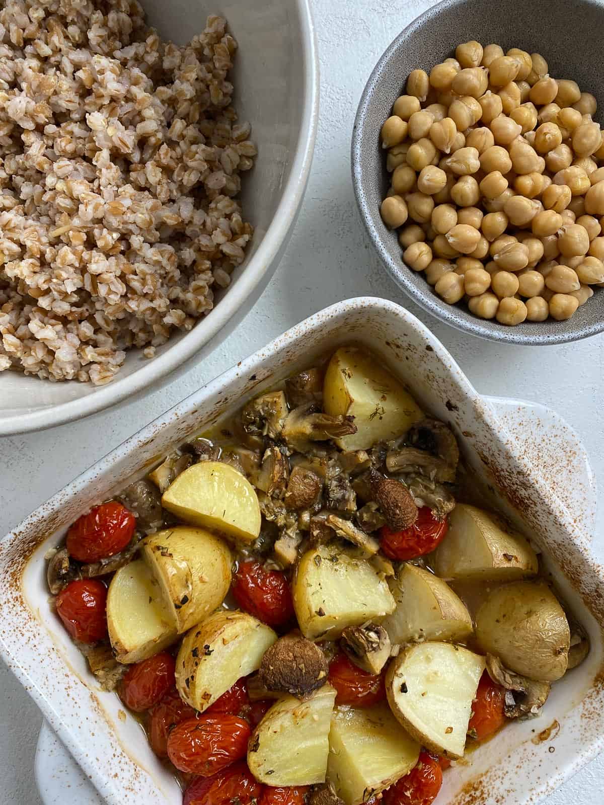 ingredients for Easy Farro Recipe with Roasted Vegetables in three separate containers