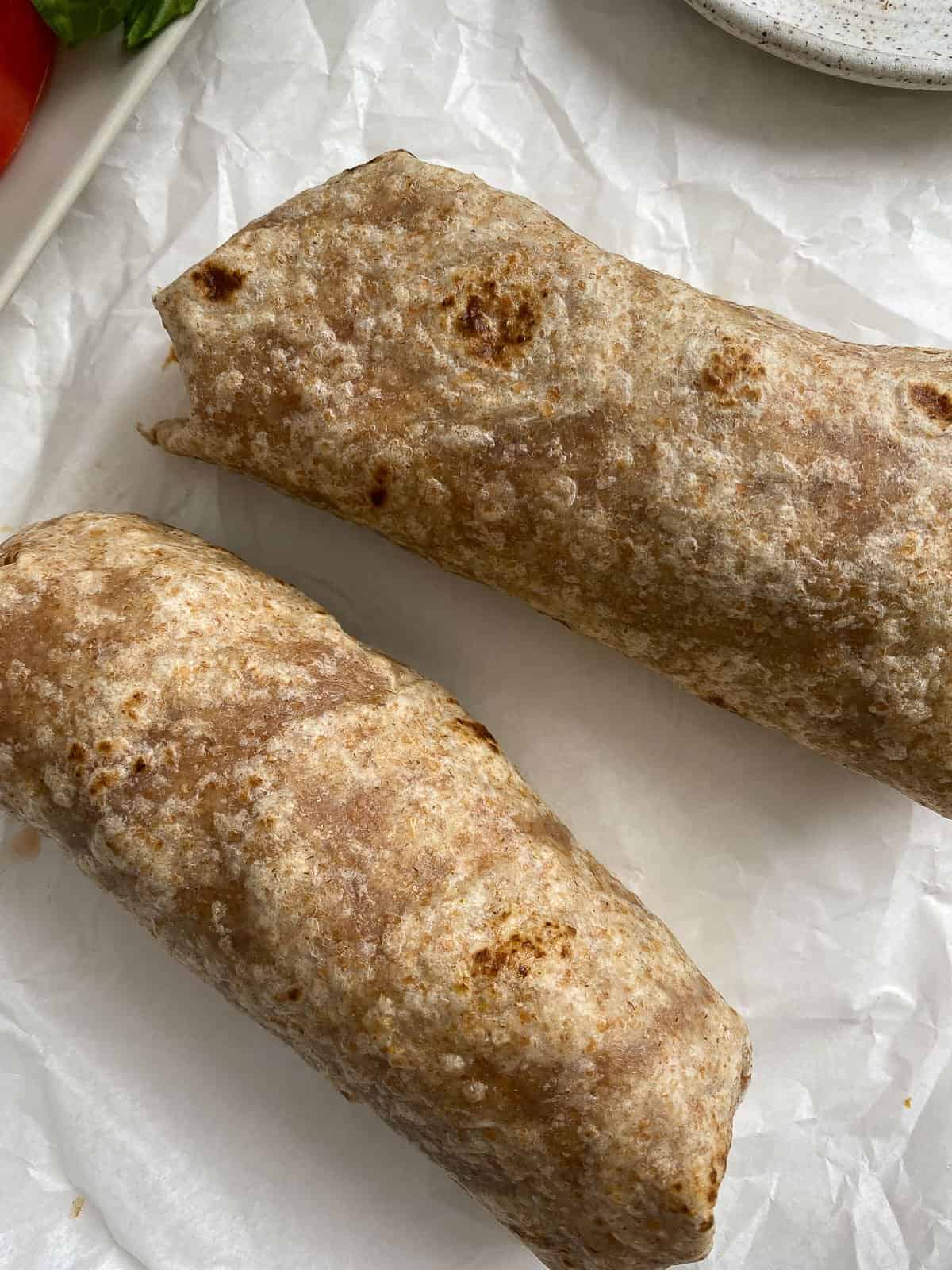 process shot showing rolled up wraps on light surface