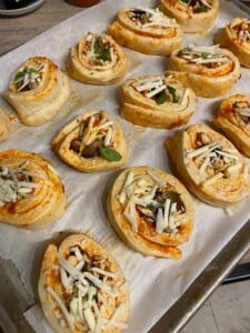 pre-baked pizza rolls on a bakcing sheet