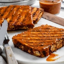 completed Grilled Tofu Steak Recipe plated on a white plate