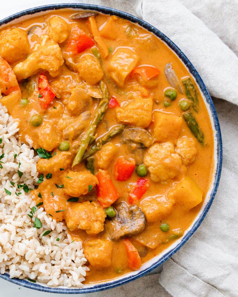 completed Butternut Squash Curry in a bowl against a white background