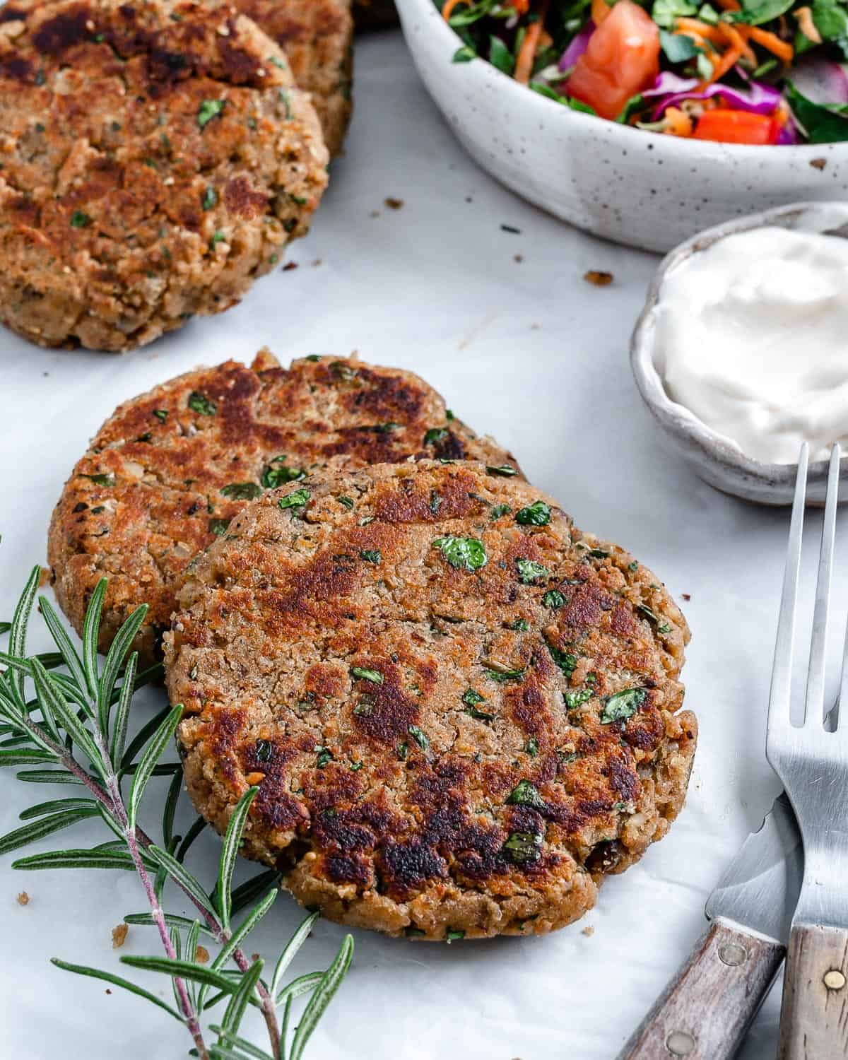 3 completed White Bean Burger patties against white surface