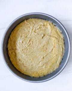 process showing Orange Olive Oil Cake batter placed in cake pan