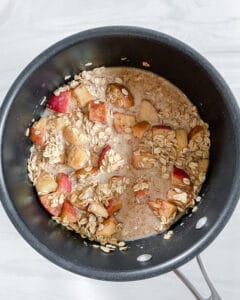 process of apples and oats in a pan