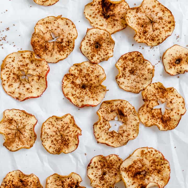 completed Baked Apple Chips against a white surface
