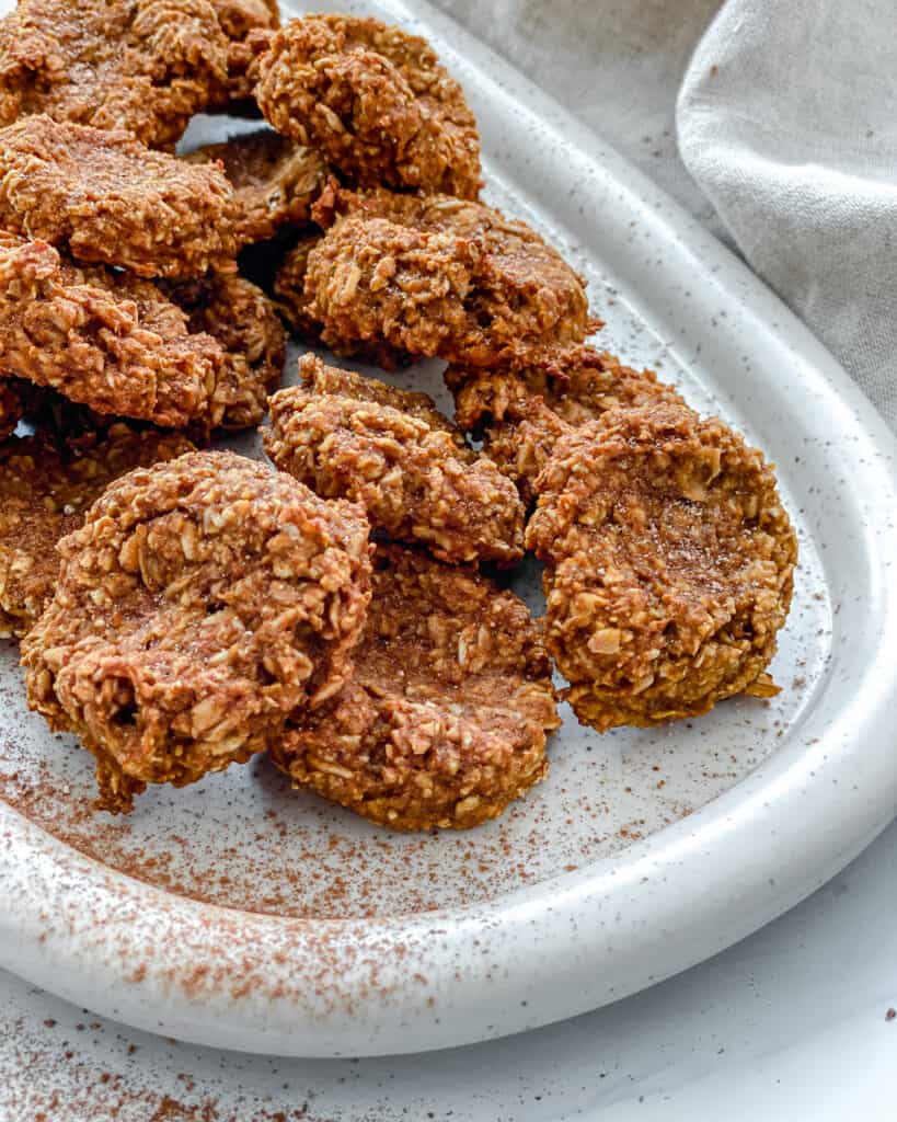 completed pumpkin oatmeal cookies on a white tray 