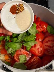 process of adding spices to pan