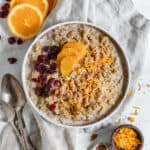 completed Cinnamon Orange Quinoa in a bowl against a light surface