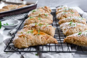 completed vanilla scones on a wire cooling rack