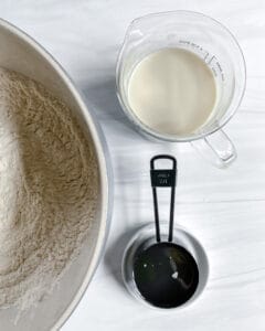 process of vanilla scones being made with wet and dry ingredients in separate bowls