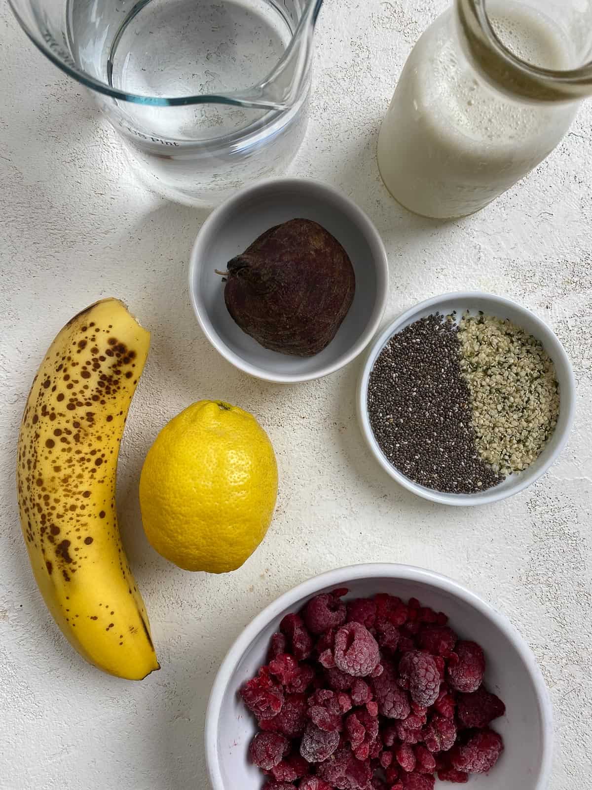 ingredients for Banana Beet Smoothie measured out against a white surface