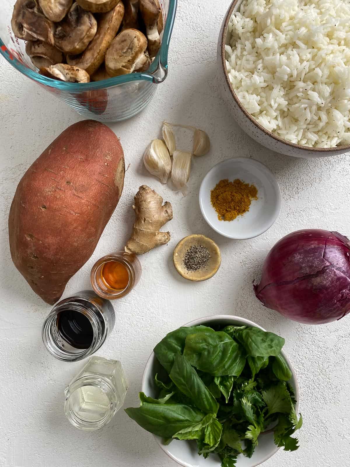 ingredients for Healthy Sweet Potato Fried Rice measured out against a white background