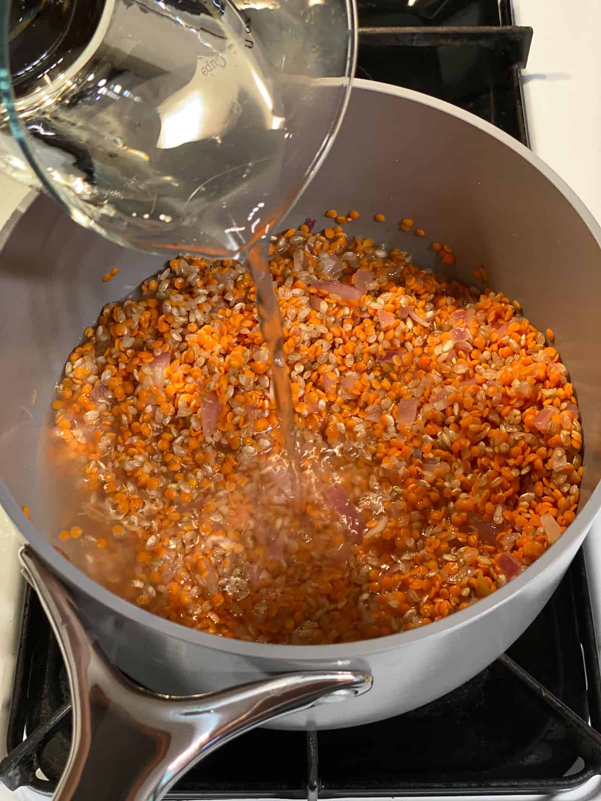 Process of adding water to the pot