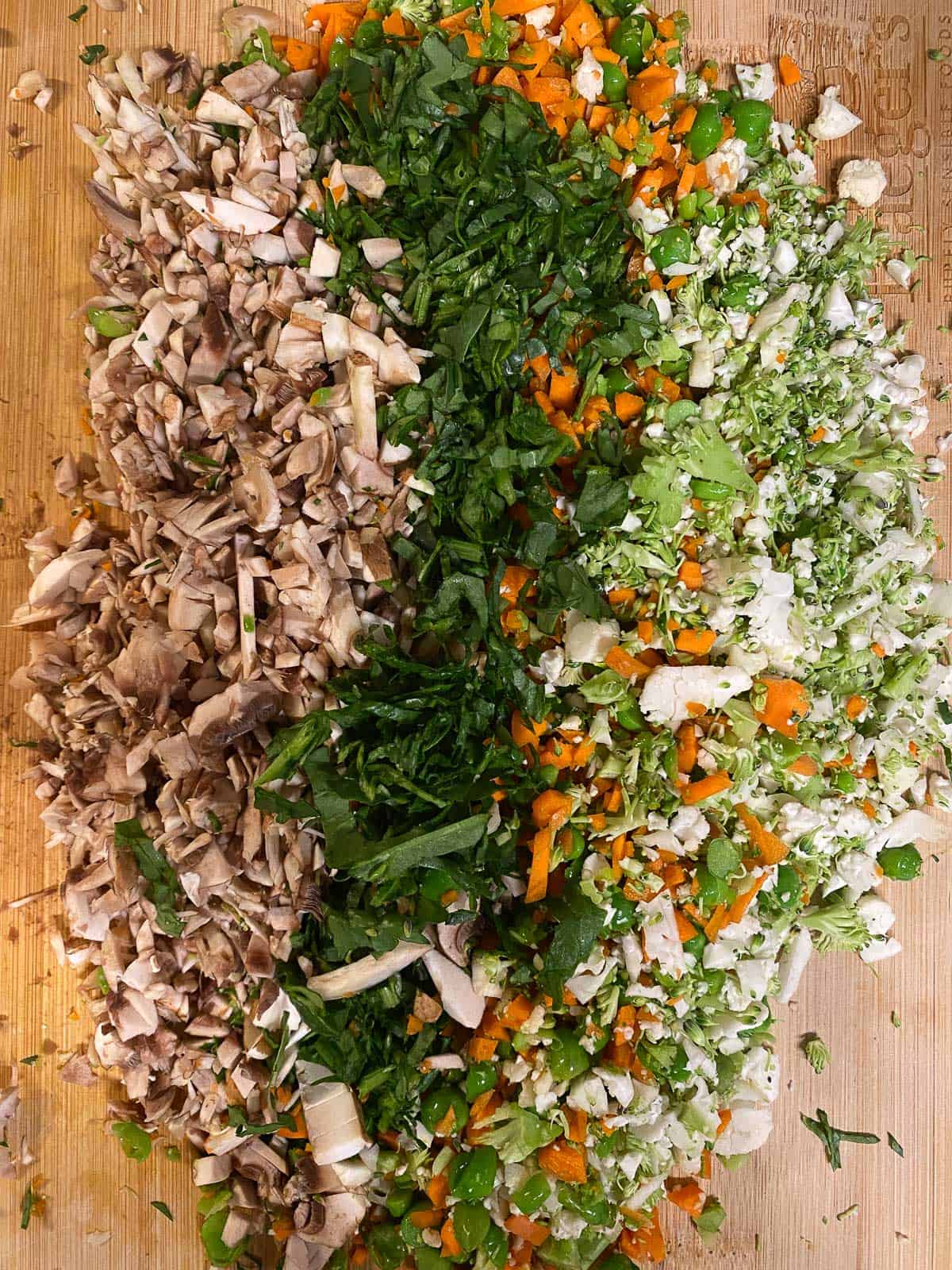 process shot showing minced veggies on cutting board