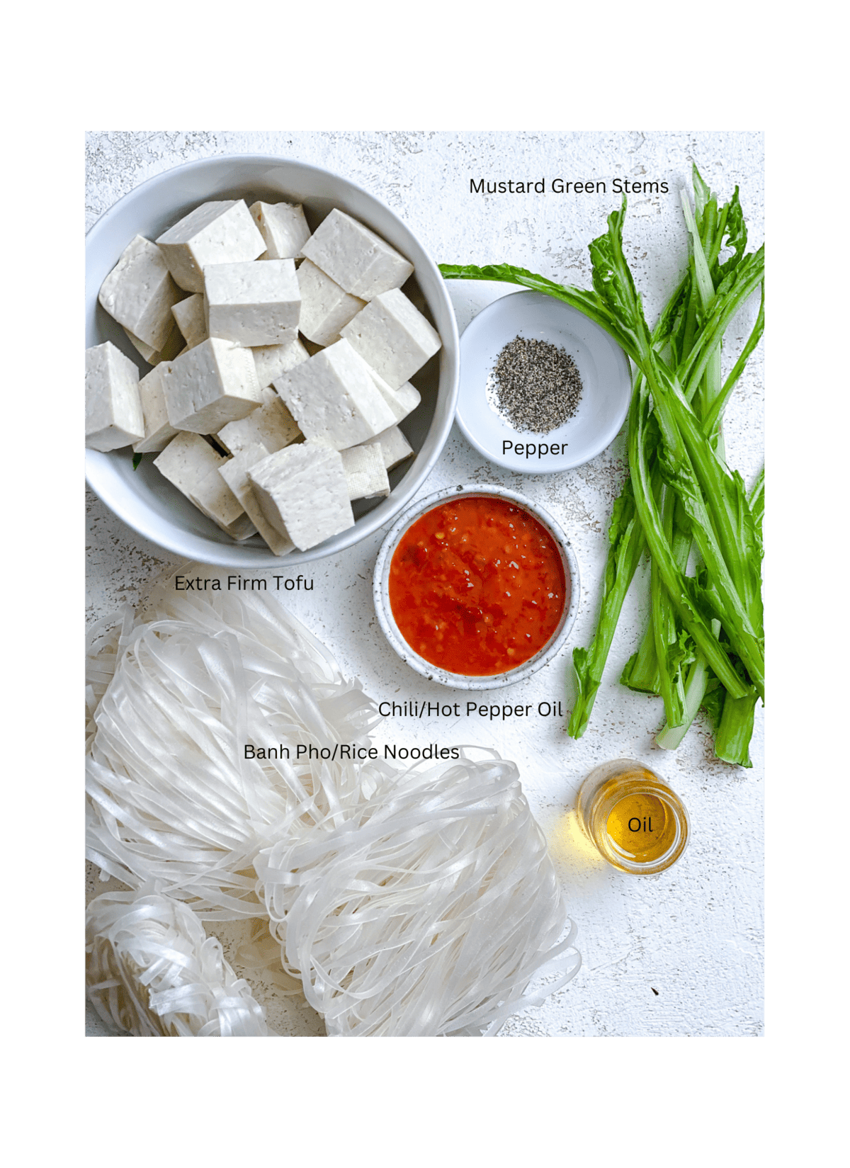 ingredients for Hearty Pureed Veggie Soup measured out against a white surface