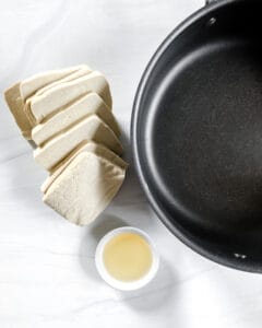 ingredients for Spicy and Sweet Tofu against white background