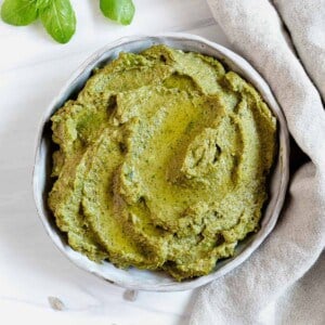 completed Sunflower Seed Pesto in a white bowl against a white background