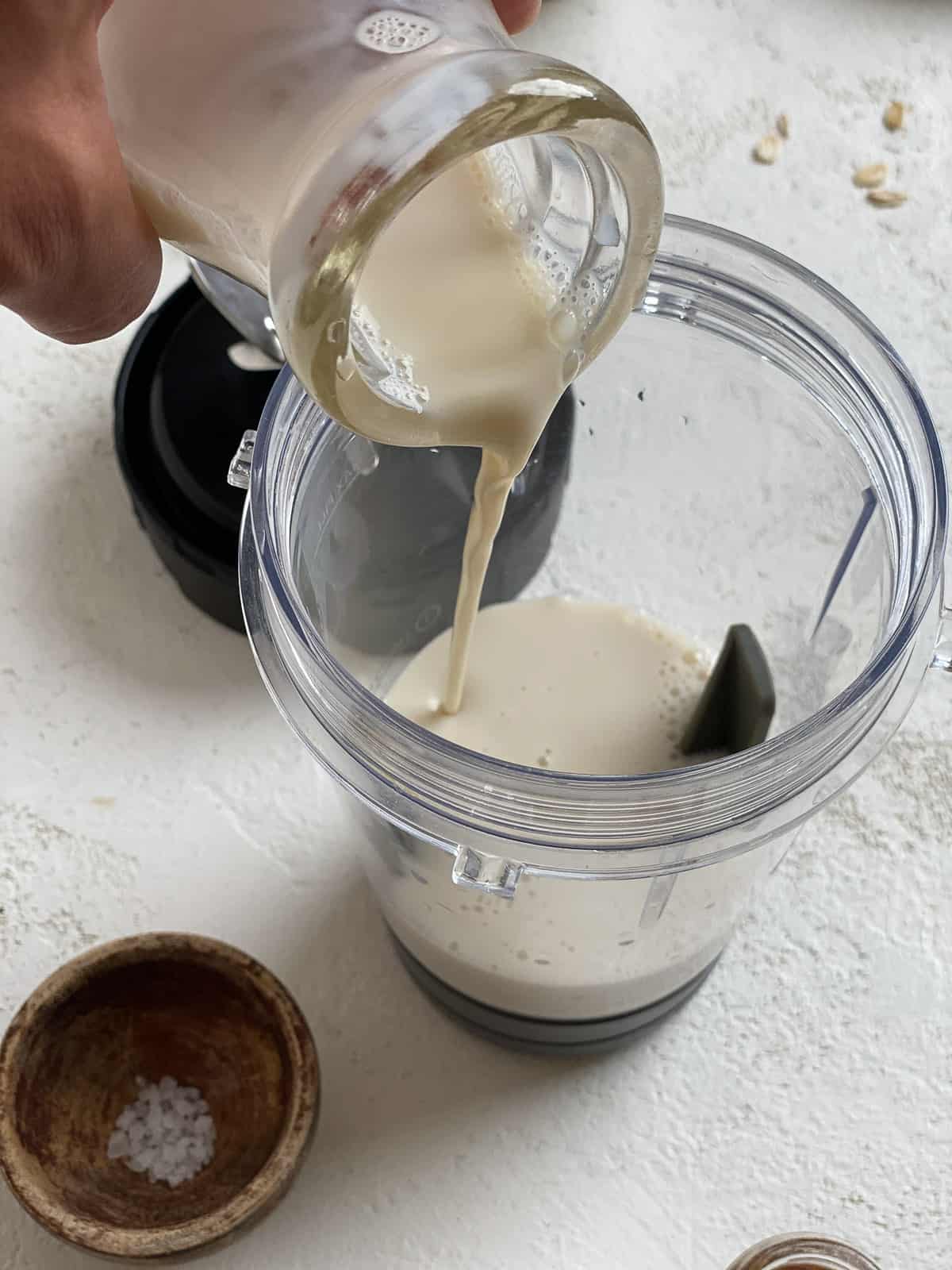 process shot of adding milk to container