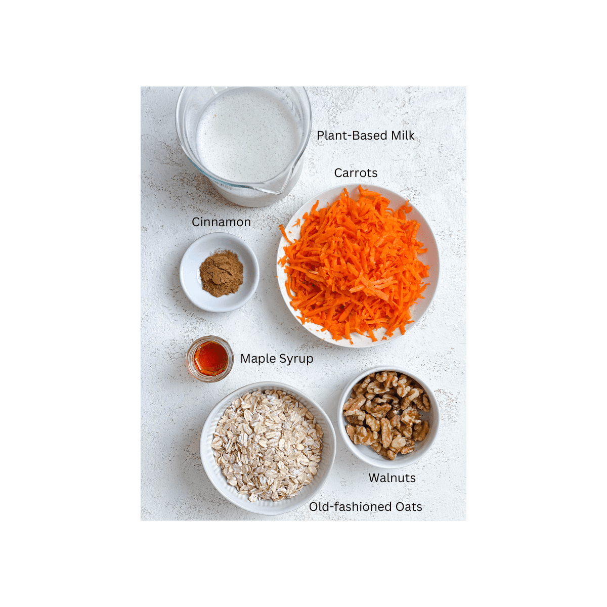 ingredients for Carrot Cake Oatmeal measured out against a white surface